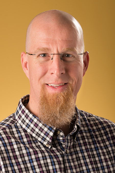 E. Jonathan Arnett